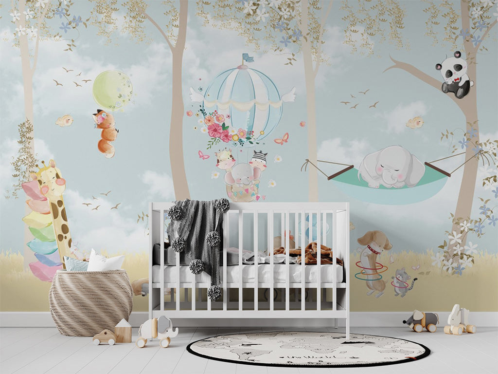 This charming illustration features a playful forest scene with adorable animals engaged in whimsical activities. A hot air balloon adorned with flowers carries smiling animals, while an elephant naps in a hammock between trees. Surrounding the scene are other animals enjoying themselves, including a bear on a unicycle and a giraffe with a colorful stack of cushions. The soft pastel colors and gentle details create a magical, serene atmosphere perfect for children’s decor.