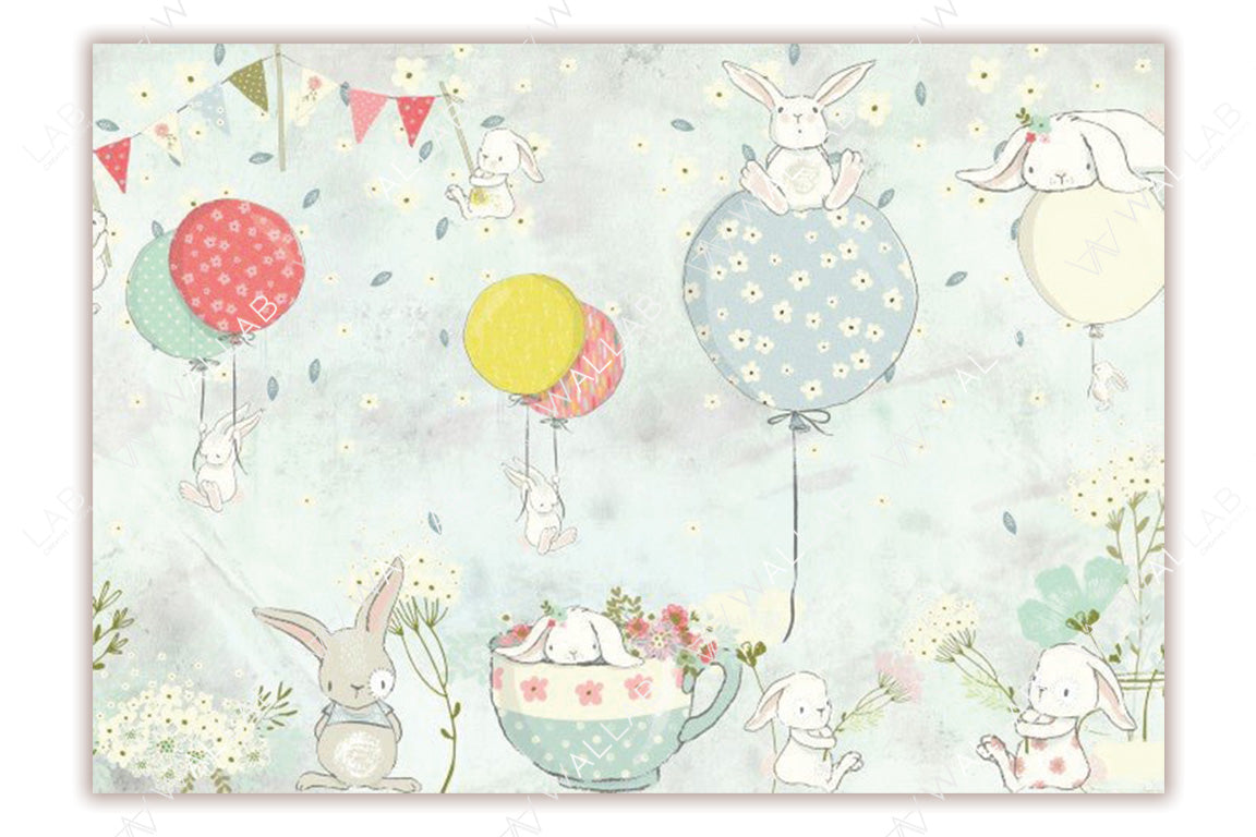This whimsical illustration features adorable bunnies in a playful scene with colorful balloons and a floral tea cup. The soft pastel colors, including blues, pinks, and yellows, create a calming and cheerful atmosphere. Perfect for nursery decor or children's spaces, this design radiates charm and innocence.