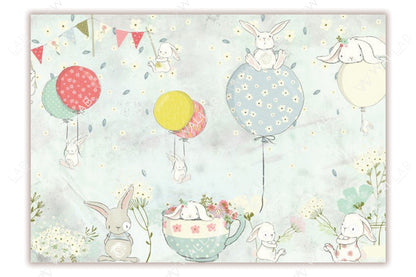 This whimsical illustration features adorable bunnies in a playful scene with colorful balloons and a floral tea cup. The soft pastel colors, including blues, pinks, and yellows, create a calming and cheerful atmosphere. Perfect for nursery decor or children's spaces, this design radiates charm and innocence.