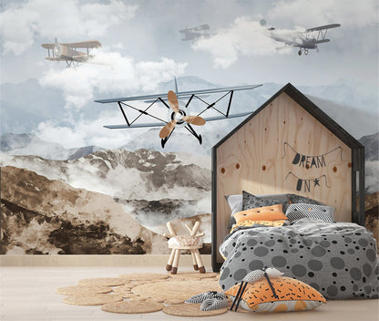 This captivating image showcases vintage biplanes soaring over rugged mountain ranges, framed by soft clouds and a dreamy sky. The leading biplane with a wooden propeller is depicted in sharp detail, while others appear hazy in the background, adding depth and movement. A nostalgic representation of early aviation against a stunning natural backdrop.