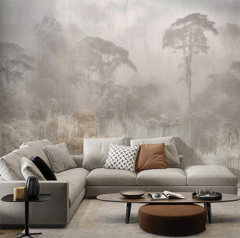 A serene wallpaper mural depicting a misty rainforest with tall, silhouetted trees and dense foliage fading into soft, muted tones. The design evokes a tranquil and atmospheric feeling, with a painterly texture that adds depth and elegance. Ideal for creating a calm, nature-inspired ambiance in any space.