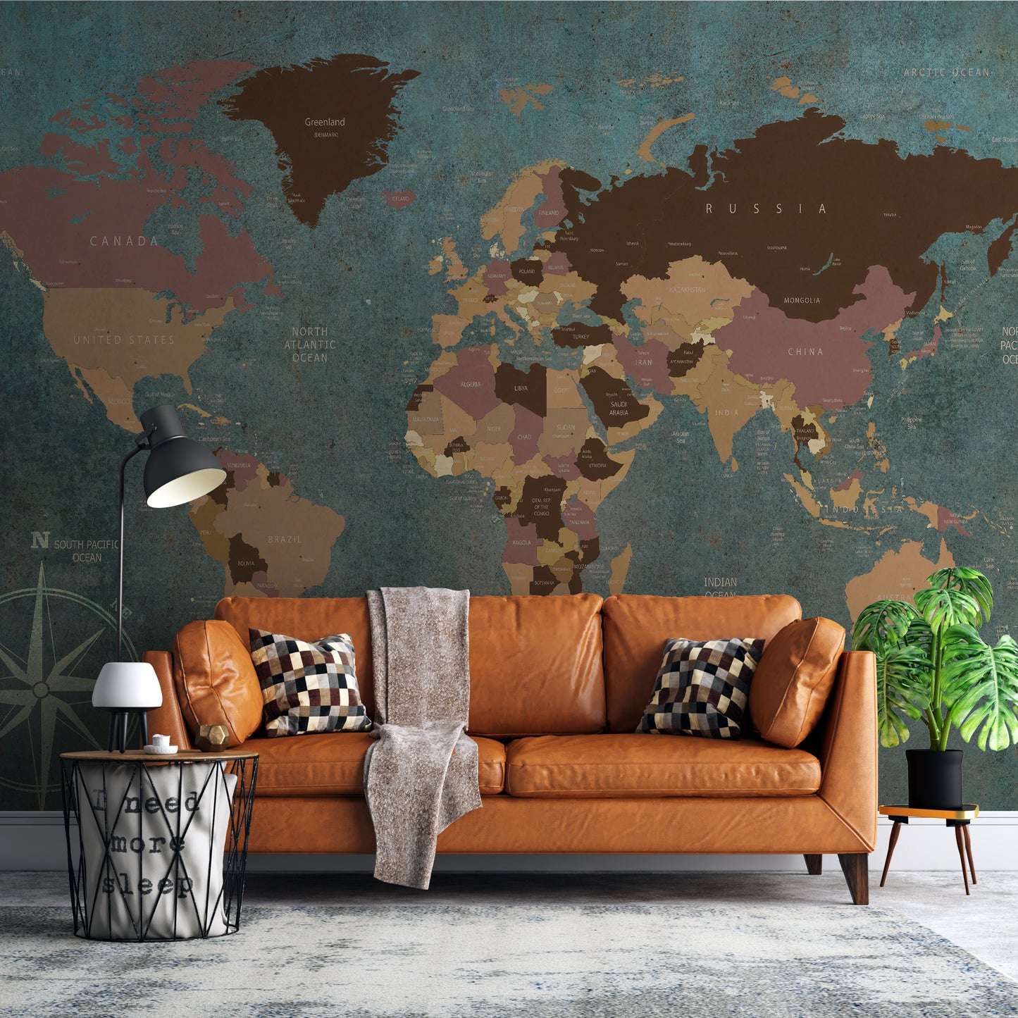 A vintage-style world map wallpaper mural featuring muted earth tones on a textured background. The map includes labeled countries, continents, and oceans, with a decorative compass rose in the bottom left corner. Ideal for adding a timeless, globetrotting vibe to office or living spaces.